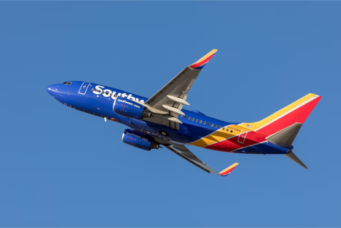 Commercial Southwest Airlines passenger jet taking off at Sky Harbor Airport in Phoenix, Arizona.